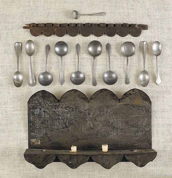 Tin spoon rack together with a