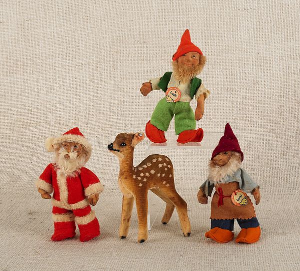 Four Stieff Christmas dolls together