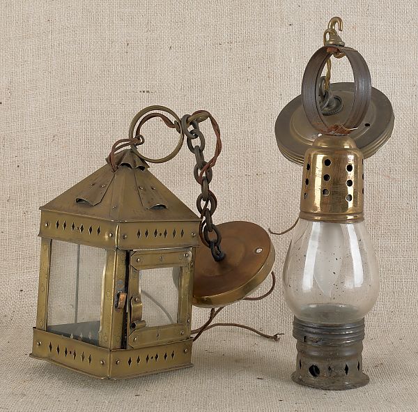 Two brass lanterns. ?