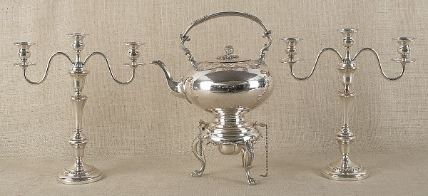 Pair of silver plated candelabra together