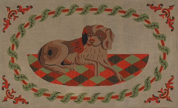 American hooked rug with a spaniel