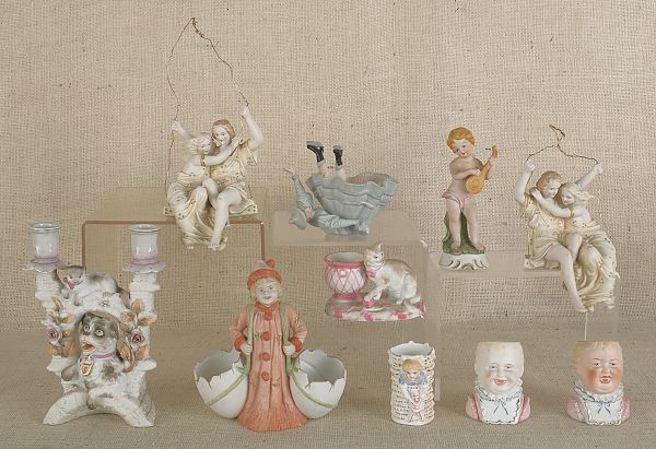 Ten bisque figural tablewares. ?