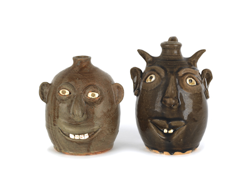 Two Georgia stoneware face jugs