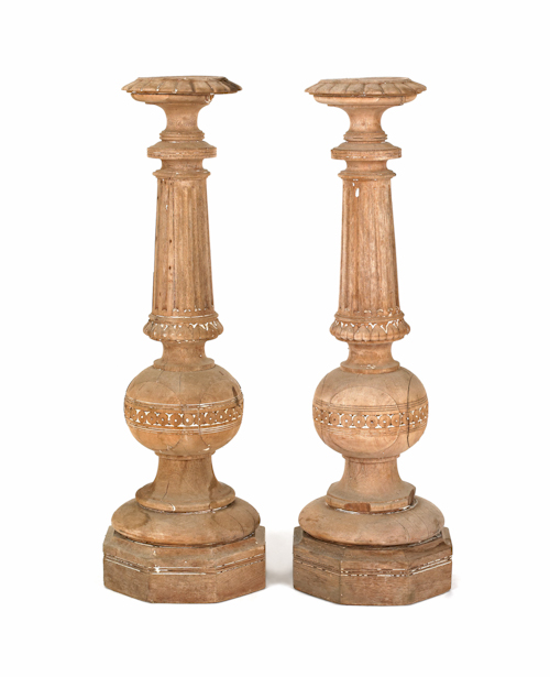 Pair of carved mahogany pedestals
