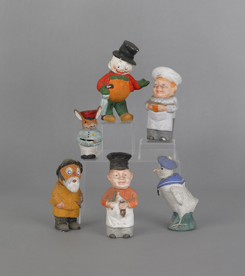 Six composition figural candy containers 1761e4