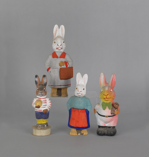 Four composition figural rabbit candy
