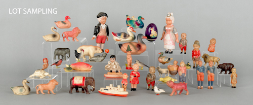 Sixty-two celluloid figural toys