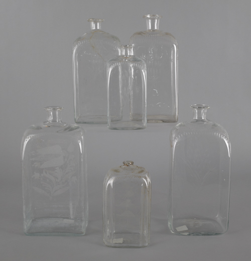 Six etched colorless glass bottles 1763a0