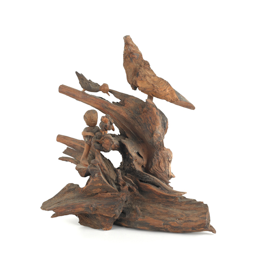 Carved driftwood of birds and a