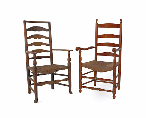 Two rush seat ladderback armchairs.