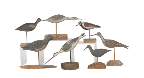 Seven carved and painted shorebird
