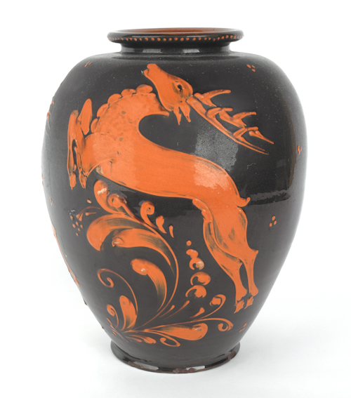 Art pottery crock with slip stag decoration