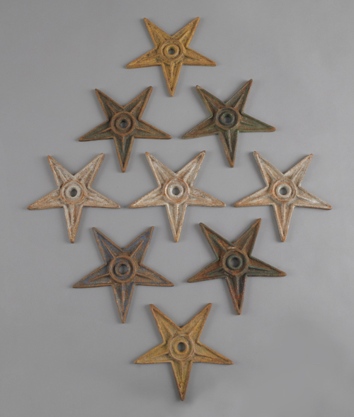 Nine cast iron architectural stars