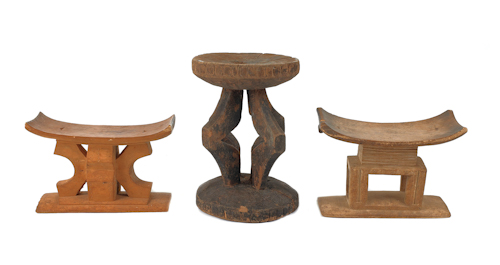 Three carved African wooden seats