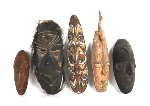 Five Papua New Guinea carved and