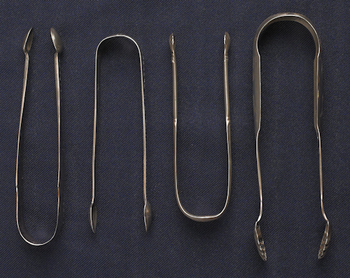 Collection of silver tongs to include 17660f