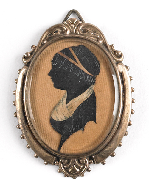 Miniature silhouette profile of a woman