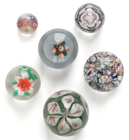 Six early glass paperweights to