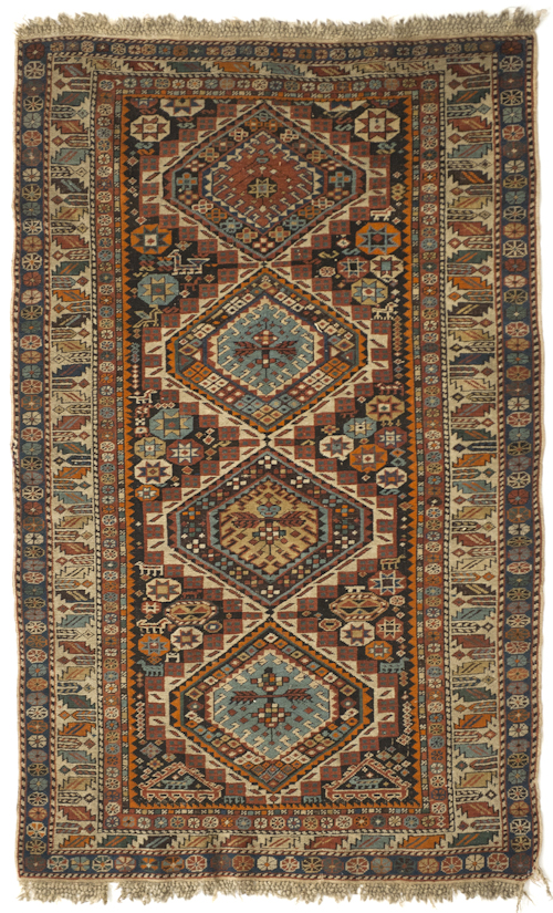 Caucasian throw rug with four medallions 17672f