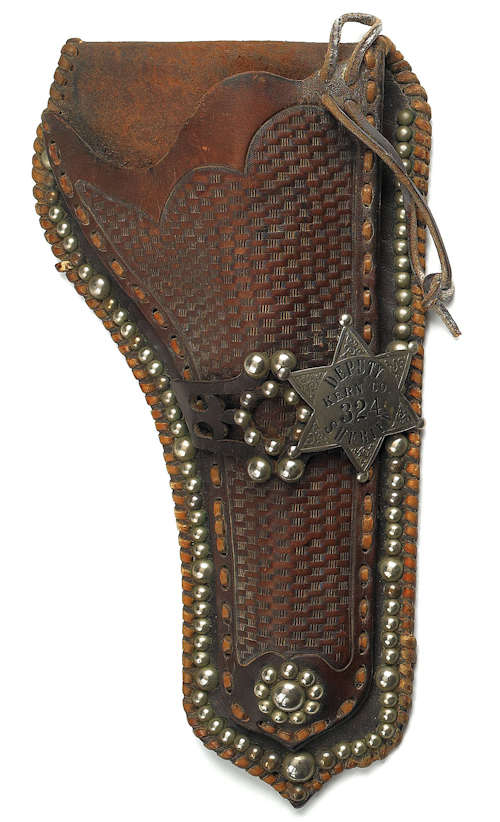 Leather tooled holster with a silver