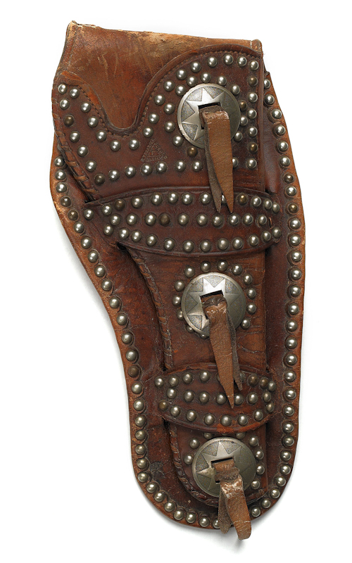 Leather holster with ornate tacking