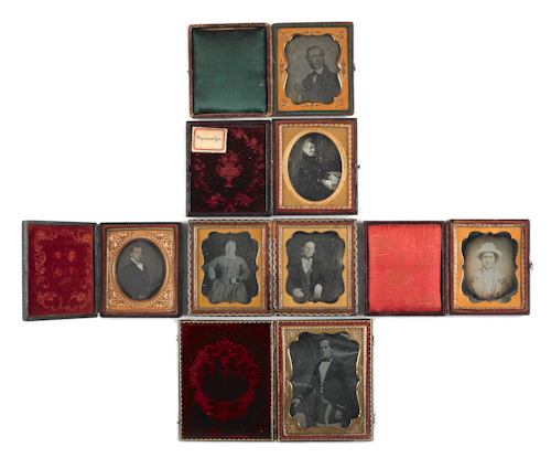 Four daguerreotypes of men holding