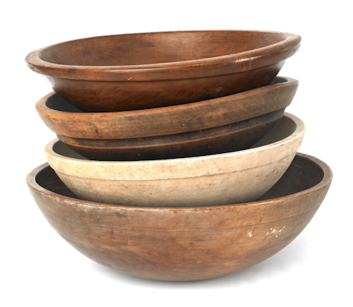 Four turned wood bowls largest