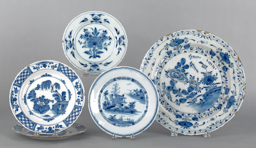 Four Delft blue and white plates