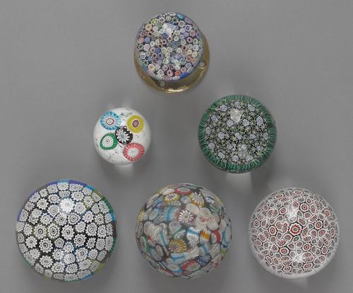 Six millefiori glass paperweights to