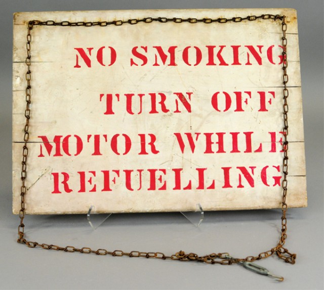 NO SMOKING WHILE REFUELING SIGN