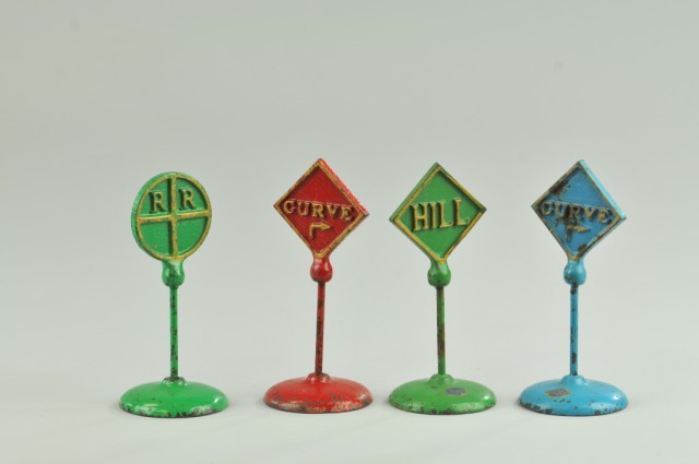 LOT OF FOUR ROAD SIGNS Arcade cast