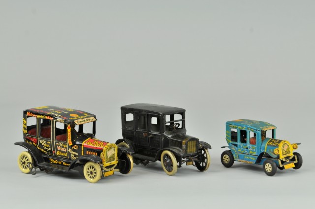 GROUPING OF THREE TIN SEDANS Includes 1790e9