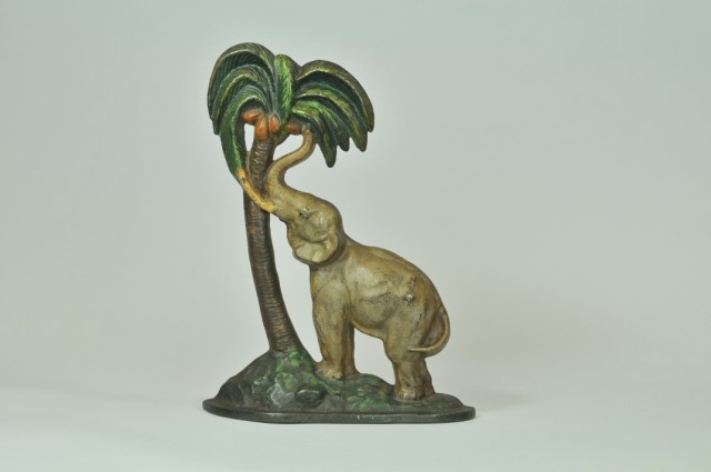 ELEPHANT BY COCONUT TREE DOORSTOP National