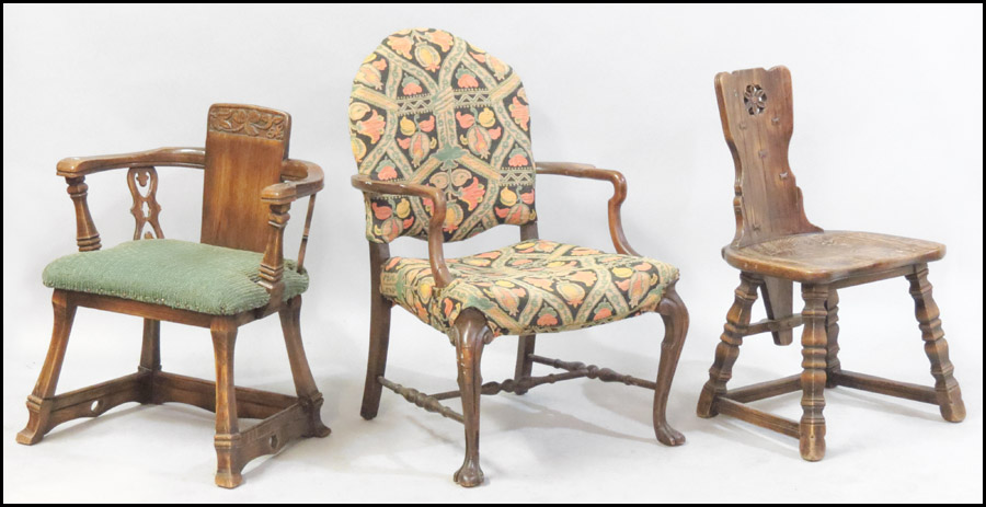 TWO CARVED OAK ARTS AND CRAFTS CHAIRS.