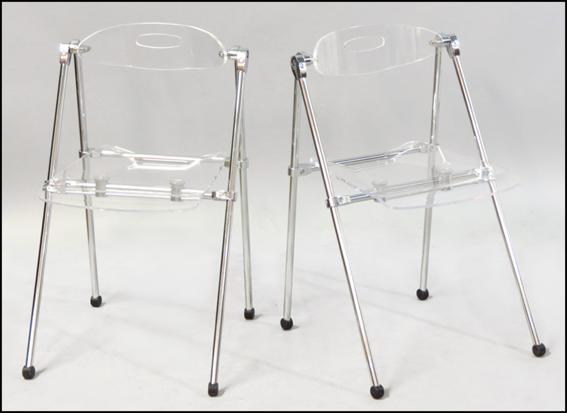 PAIR OF LUCITE FOLDING CHAIRS.