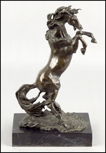 PATINATED BRONZE FIGURE OF A REARING
