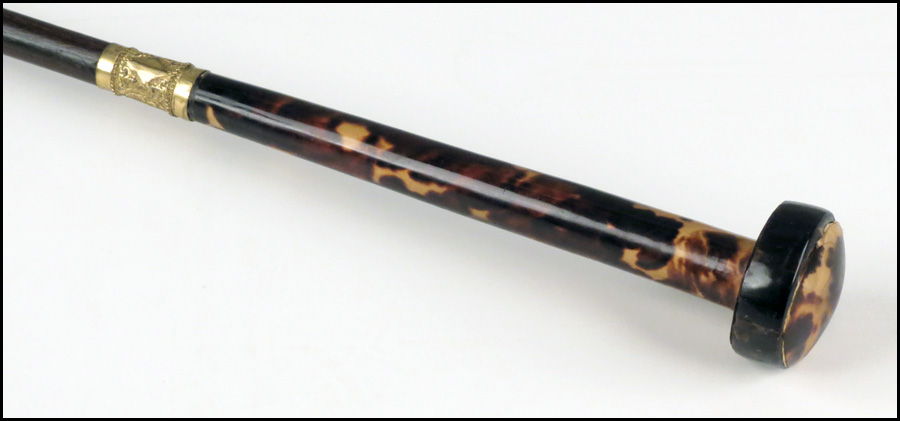 TORTOISE SHELL HANDLE WALKING STICK.