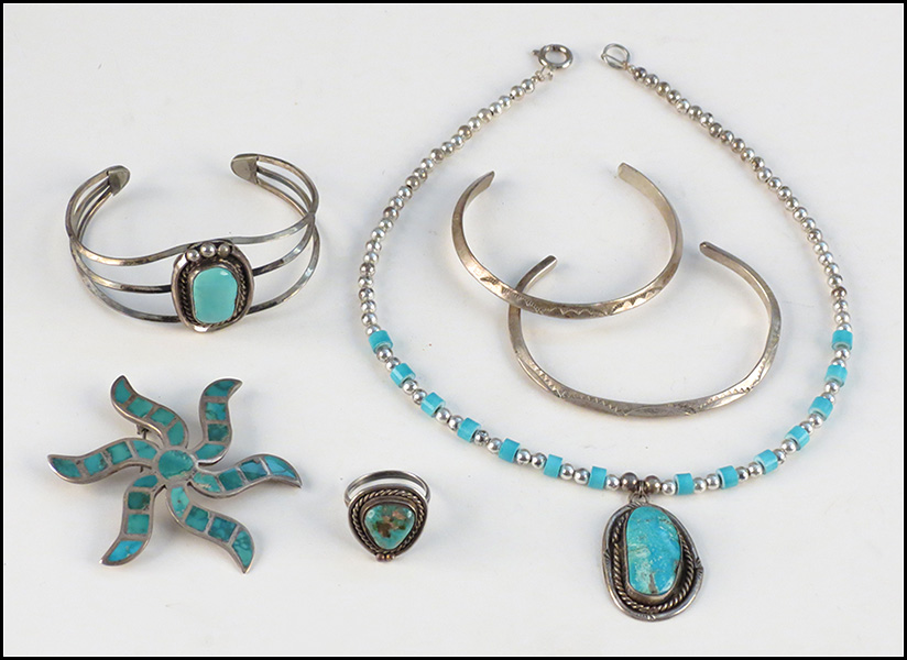 GROUP OF TURQUOISE AND SILVER JEWELRY.