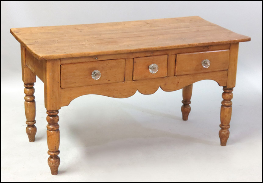 PINE THREE DRAWER TABLE. H: 28 W: