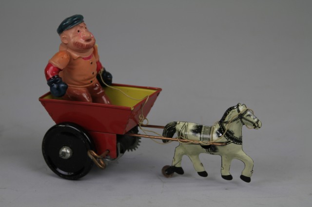 BRUTUS IN CART Marx tin litho with