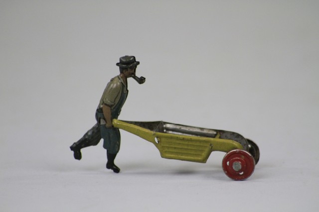 MAN WITH PIPE AND WHEELBARROW PENNY 17a0d5