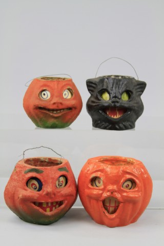 THREE PUMPKIN FACE LANTERNS AND BLACK