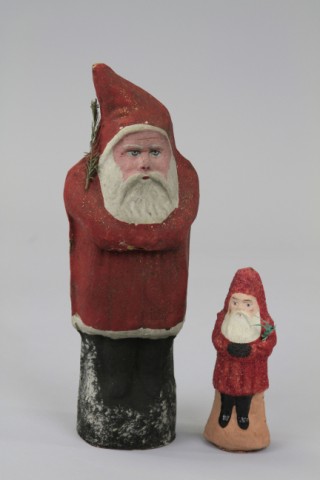 TWO GERMAN PRESSED CARDBOARD SANTAS 17a167