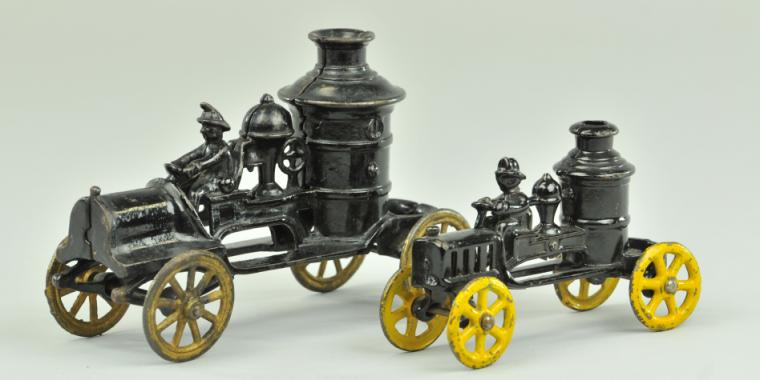 LOT OF TWO CAST IRON FIRE PUMPERS