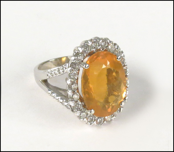 18 KARAT WHITE GOLD FIRE OPAL AND 177fe3