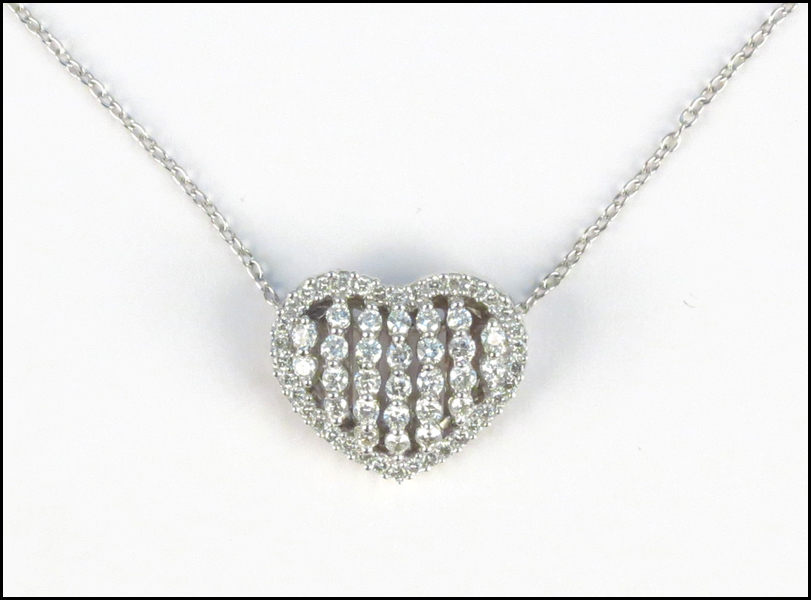 DIAMOND AND 18 KARAT WHITE GOLD HEART