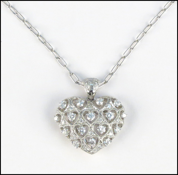 DIAMOND AND 18 KARAT WHITE GOLD HEART