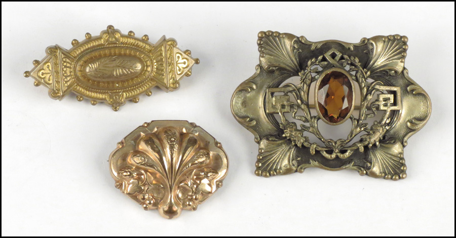 THRE VICTORIAN GOLD FILLED BROOCHES.