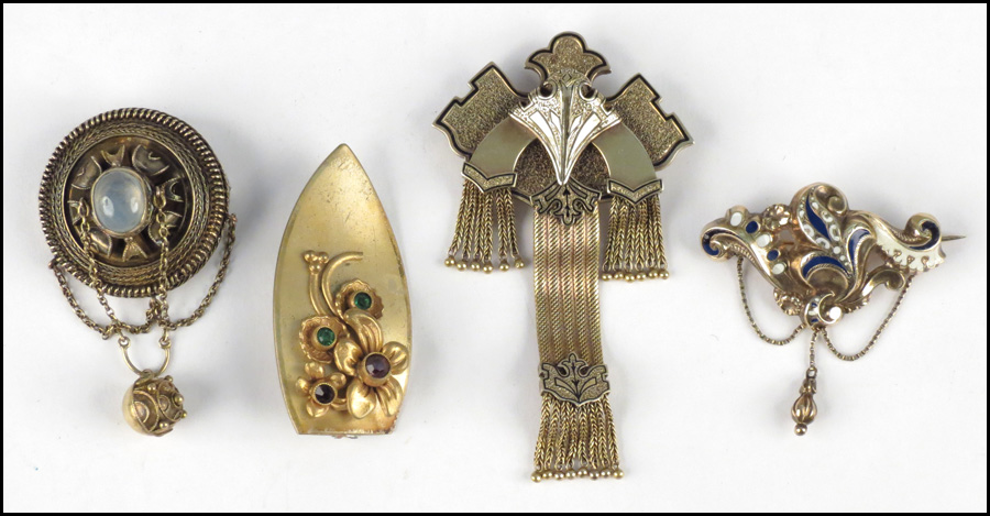 FOUR VICTORIAN GOLD FILLED BROOCHES.