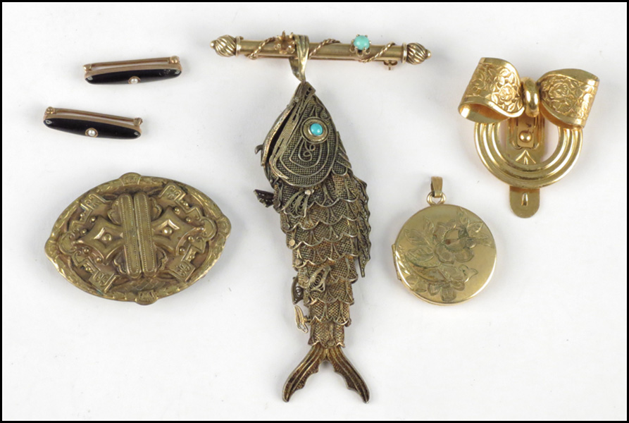 TWO VICTORIAN GOLD FILLED BROOCHES.